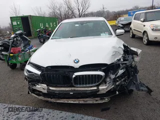 2018 BMW 5 Series 530e xDrive with VIN WBAJB1C50JG624043, listed as a IAAI auction lot 41814687 with 41,301 mi miles and . Bid and sale history available at DreamBid. Image 12.