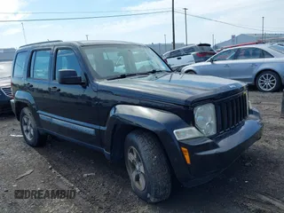 2008 Jeep Liberty Sport with VIN 1J8GN28K48W232491, listed as a IAAI auction lot 42212873 with 142,557 mi miles. Bid and sale history available at carsss.com. Image 1.