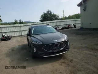 2021 Ford Escape SEL Hybrid z VIN 1FMCU9CZ7MUA94260, wystawiony jako Copart lot #71013514 z przebiegiem Nie podano mil oraz Szkoda całkowita • Salvage title. Historia ofert i sprzedaży dostępna na DreamBid. Obrazek 12.