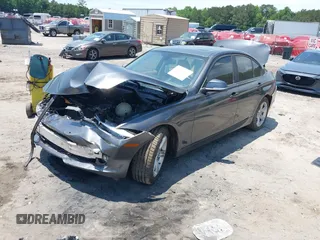 2013 BMW 3 Series 320i with VIN WBA3B1C50DK130310, listed as a IAAI auction lot 42341291 with 176,000 mi miles and . Bid and sale history available at DreamBid. Image 2.