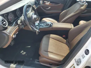 2017 Mercedes-Benz E 300 Luxury with VIN WDDZF4KB2HA061308, listed as a Copart auction lot 60214295 with 97,317 mi miles and Salvage title. Bid and sale history available at DreamBid. Image 7.