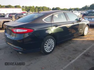 2013 Ford Fusion SE Hybrid с VIN 3FA6P0LU3DR351906, выставлен на аукционе IAAI как лот 42841416 с пробегом 243 206 миль миль и . История ставок и продаж доступна на DreamBid. Изображение 4.