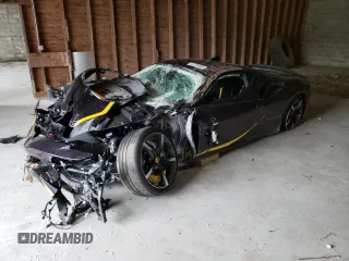 2023 Ferrari SF90 z VIN ZFF95NLA8P0299159, wystawiony jako Copart lot #52724044 z przebiegiem Nie podano mil oraz Szkody całkowita. Historia ofert i sprzedaży dostępna na DreamBid. Obrazek 1.