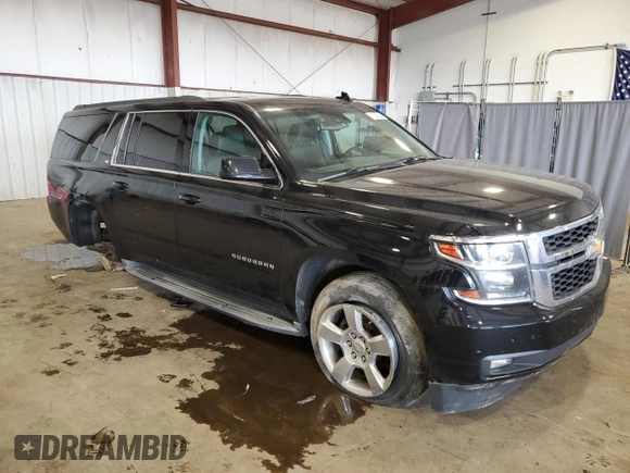 2016 Chevrolet Suburban LT with VIN 1GNSKHKC3GR117500, listed as a Copart auction lot 71548544 with 145,028 mi miles and Salvage Title. Bid and sale history available at DreamBid. Image 4.