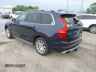 2016 Volvo XC90 T6 Momentum with VIN YV4A22PK7G1058660, listed as a IAAI auction lot 42201130 with 130,487 mi miles. Bid and sale history available at carsss.com. Image 3.