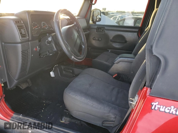 2003 Jeep Wrangler Sport with VIN 1J4FA49S73P301468, listed as a Copart auction lot 87415164 with 127,985 mi miles and Salvage Title. Bid and sale history available at carsss.com. Image 7.