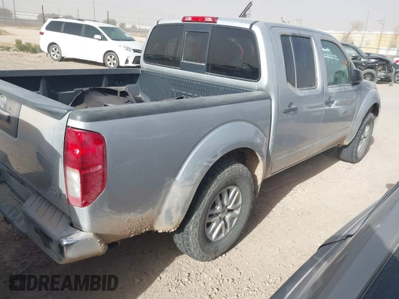 2014 Nissan Frontier SV with VIN 1N6AD0ER0EN759772, listed as a IAAI auction lot 41479252 with 153,630 mi miles and . Bid and sale history available at DreamBid. Image 4.