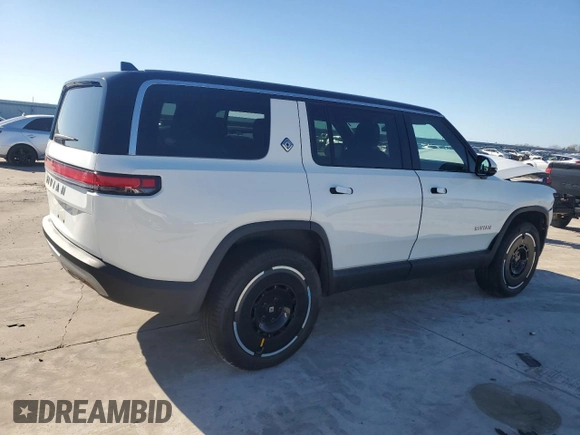 2025 Rivian R1S Adventure z VIN 7PDSGBBA3SN046975, wystawiony jako Copart lot #42880125 z przebiegiem Nie podano mil oraz Szkoda całkowita • Salvage title. Historia ofert i sprzedaży dostępna na DreamBid. Obrazek 3.