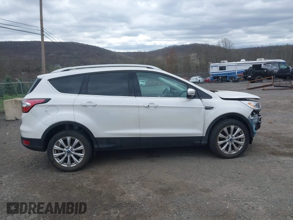 2018 Ford Escape Titanium with VIN 1FMCU9J90JUD53380, listed as a IAAI auction lot 42042802 with 30,371 mi miles and . Bid and sale history available at DreamBid. Image 14.