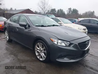 2017 Mazda Mazda6 Touring with VIN JM1GL1V54H1135424, listed as a IAAI auction lot 41773489 with 85,094 mi miles. Bid and sale history available at carsss.com. Image 1.