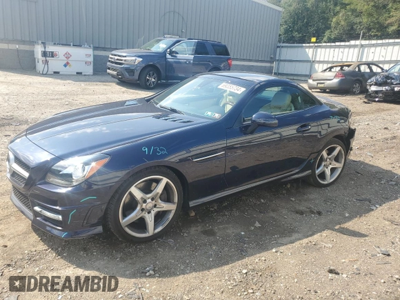 2012 Mercedes-Benz SLK 250 with VIN WDDPK4HA0CF037649, listed as a Copart auction lot 69355734 with 23,606 mi miles and Salvage title. Bid and sale history available at DreamBid. Image 1.