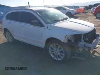 2011 Dodge Caliber Heat with VIN 1B3CB5HA5BD249182, listed as a IAAI auction lot 41831735 with 98,491 mi miles and . Bid and sale history available at DreamBid. Image 1.