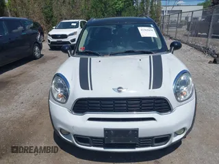 2012 MINI Countryman S z VIN WMWZC3C58CWM26699, wystawiony jako IAAI lot #42361630 z przebiegiem 88 177 mil mil oraz . Historia ofert i sprzedaży dostępna na DreamBid. Obrazek 6.