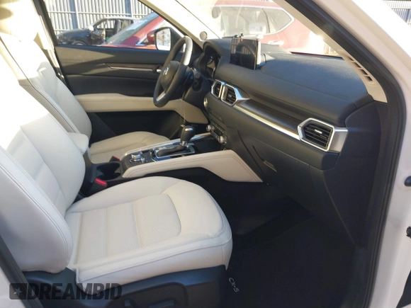 2023 Mazda CX-5 2.5 S Premium Plus Package with VIN JM3KFBEM2P0244281, listed as a IAAI auction lot 40820295 with 10,886 mi miles. Bid and sale history available at carsss.com. Image 5.
