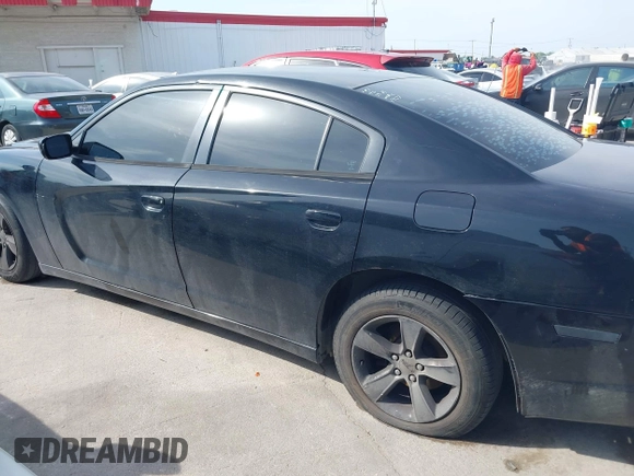 2014 Dodge Charger SE with VIN 2C3CDXBG9EH329419, listed as a IAAI auction lot 42025607 with 166,875 mi miles. Bid and sale history available at carsss.com. Image 14.