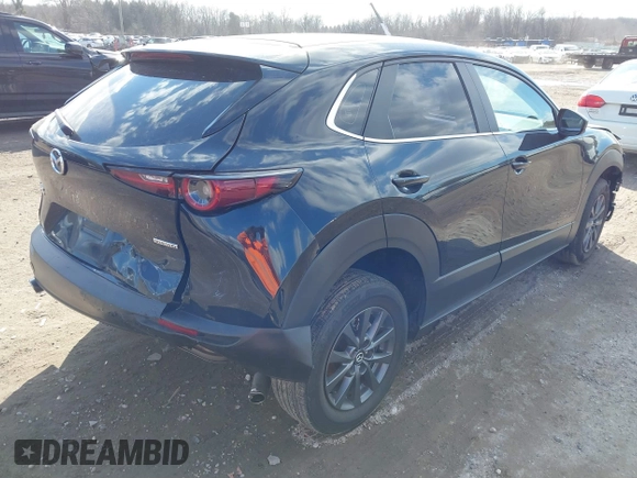 2022 Mazda CX-30 S with VIN 3MVDMBALXNM402265, listed as a IAAI auction lot 41458605 with 76,291 mi miles and . Bid and sale history available at carsss.com. Image 4.