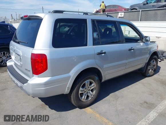 2005 Honda Pilot EX-L z VIN 2HKYF18515H550101, wystawiony jako IAAI lot #42182151 z przebiegiem 118 159 mil mil oraz . Historia ofert i sprzedaży dostępna na DreamBid. Obrazek 4.
