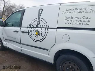 2014 Ram Cargo Van Tradesman with VIN 2C4JRGAG8ER428412, listed as a IAAI auction lot 41893130 with 97,411 mi miles. Bid and sale history available at carsss.com. Image 14.