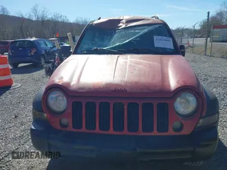 2005 Jeep Liberty Sport with VIN 1J4GL48K35W645419, listed as a IAAI auction lot 41823845 with 168,896 mi miles. Bid and sale history available at carsss.com. Image 12.