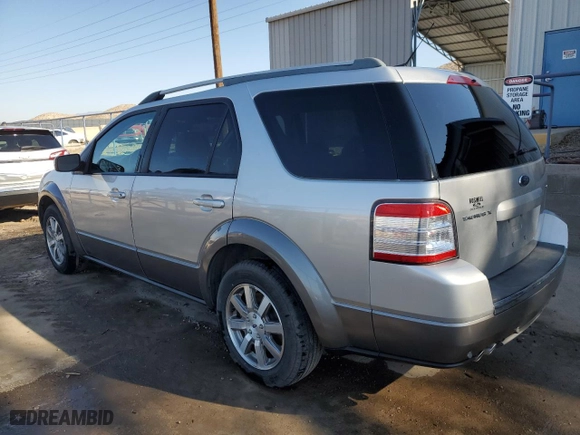 2009 Ford Taurus X SEL with VIN 1FMDK02W69GA04132, listed as a Copart auction lot 77351264 with 87,769 mi miles and Salvage Title. Bid and sale history available at carsss.com. Image 2.