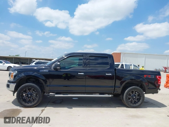 2019 Ford F-150 XL with VIN 1FTEW1E59KKE90346, listed as a IAAI auction lot 42188308 with 130,992 mi miles and . Bid and sale history available at DreamBid. Image 14.