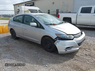 2011 Honda Insight LX z VIN JHMZE2H54BS010377, wystawiony jako IAAI lot #42282249 z przebiegiem 165 681 mil mil oraz . Historia ofert i sprzedaży dostępna na DreamBid. Obrazek 1.