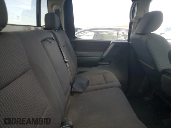 2010 Nissan Titan XE with VIN 1N6BA0EJ5AN318639, listed as a Copart auction lot 69776984 with 158,913 mi miles and Salvage Title. Bid and sale history available at carsss.com. Image 10.
