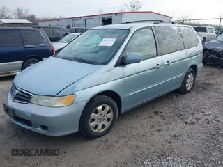 2004 Honda Odyssey EX-RES z VIN 5FNRL18864B093614, wystawiony jako IAAI lot #41674733 z przebiegiem 237 552 mil mil oraz . Historia ofert i sprzedaży dostępna na DreamBid. Obrazek 2.
