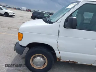 2004 Ford Econoline Cargo with VIN 1FTNE24W84HB38152, listed as a IAAI auction lot 42090193 with 102,357 mi miles. Bid and sale history available at carsss.com. Image 12.