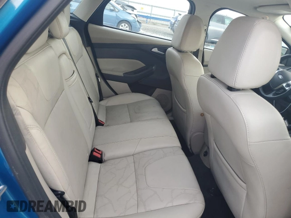 2014 Ford Focus Electric z VIN 1FADP3R41EL341620, wystawiony jako Copart lot #87277454 z przebiegiem 67 589 mil mil oraz Szkody całkowita. Historia ofert i sprzedaży dostępna na DreamBid. Obrazek 10.