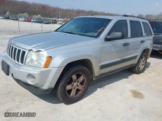 2005 Jeep Grand Cherokee Laredo with VIN 1J4GS48K45C633414, listed as a IAAI auction lot 41797842 with 311,852 mi miles. Bid and sale history available at carsss.com. Image 2.