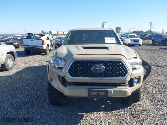 2018 Toyota Tacoma SR with VIN 3TMCZ5AN7JM125425, listed as a IAAI auction lot 40459066 with NaN miles. Bid and sale history available at carsss.com. Image 12.