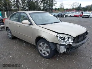 2008 Kia Optima LX with VIN KNAGE123285242331, listed as a IAAI auction lot 41938400 with 202,249 mi miles. Bid and sale history available at carsss.com. Image 1.