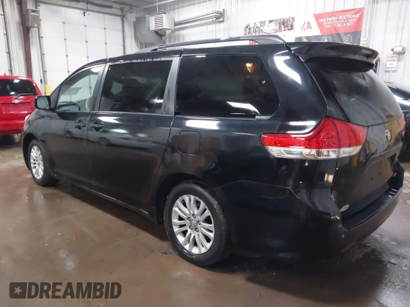 2011 Toyota Sienna XLE AAS with VIN 5TDYK3DC3BS141051, listed as a IAAI auction lot 41741058 with 236,626 mi miles. Bid and sale history available at carsss.com. Image 3.