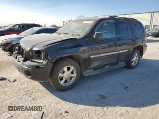 2002 GMC Envoy SLE with VIN 1GKDS13S022512481, listed as a Copart auction lot 74701454 with 0 mi miles and Salvage Title. Bid and sale history available at carsss.com. Image 1.