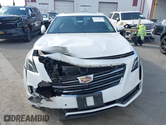 2016 Cadillac CT6 Luxury AWD with VIN 1G6KD5RSXGU154557, listed as a IAAI auction lot 41550199 with 102,536 mi miles and . Bid and sale history available at DreamBid. Image 12.