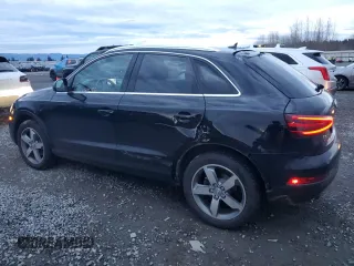 2015 Audi Q3 2.0T Prestige with VIN WA1GFCFS5FR013686, listed as a Copart auction lot 84069794 with 65,538 mi miles and Salvage Title. Bid and sale history available at carsss.com. Image 2.