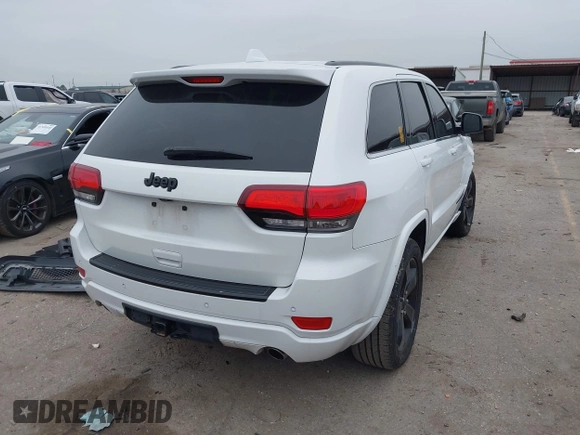 2015 Jeep Grand Cherokee Altitude with VIN 1C4RJEAG2FC901391, listed as a IAAI auction lot 41565763 with 220,685 mi miles. Bid and sale history available at carsss.com. Image 4.