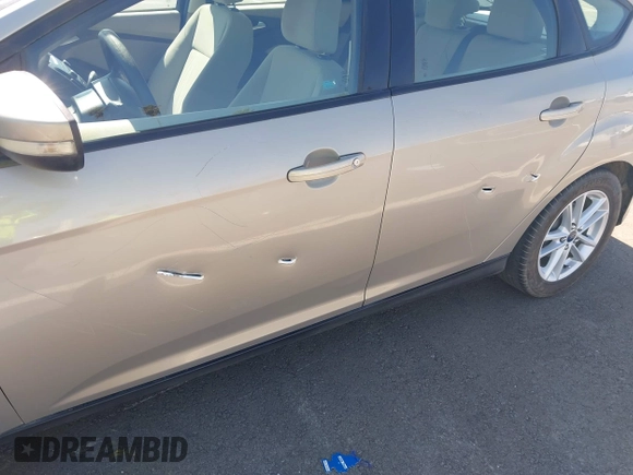2015 Ford Focus SE with VIN 1FADP3K21FL222119, listed as a IAAI auction lot 42146787 with 148,091 mi miles and . Bid and sale history available at DreamBid. Image 6.
