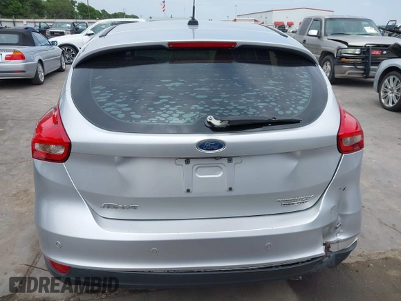 2015 Ford Focus Titanium with VIN 1FADP3N23FL356822, listed as a IAAI auction lot 41981053 with 115,584 mi miles and . Bid and sale history available at DreamBid. Image 17.