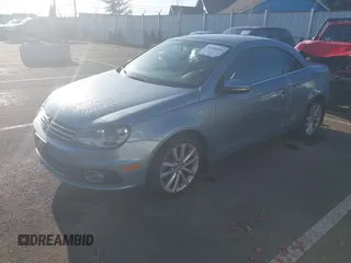 2012 Volkswagen Eos Komfort with VIN WVWBW7AH1CV022066, listed as a IAAI auction lot 41950391 with 98,877 mi miles and . Bid and sale history available at DreamBid. Image 2.