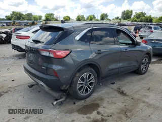 2020 Ford Escape SEL с VIN 1FMCU9H62LUB03461, выставлен на аукционе Copart как лот 62074125 с пробегом 104 462 миль миль и Списание • Salvage title. История ставок и продаж доступна на DreamBid. Изображение 3.