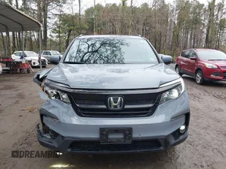 2022 Honda Pilot Special Edition with VIN 5FNYF5H20NB026028, listed as a IAAI auction lot 41801710 with 25,717 mi miles and . Bid and sale history available at carsss.com. Image 12.
