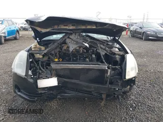 2004 Nissan Maxima SL with VIN 1N4BA41E14C890140, listed as a IAAI auction lot 41018281 with 218,229 mi miles and . Bid and sale history available at DreamBid. Image 6.
