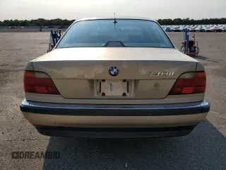 1997 BMW 7 Series 740il with VIN WBAGJ8325VDM04352, listed as a Copart auction lot 70189534 with 129,463 mi miles and Salvage Title. Bid and sale history available at carsss.com. Image 6.