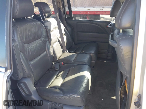 2005 Honda Odyssey EX-L z VIN 5FNRL38635B416982, wystawiony jako IAAI lot #42337383 z przebiegiem 350 647 mil mil oraz . Historia ofert i sprzedaży dostępna na DreamBid. Obrazek 8.