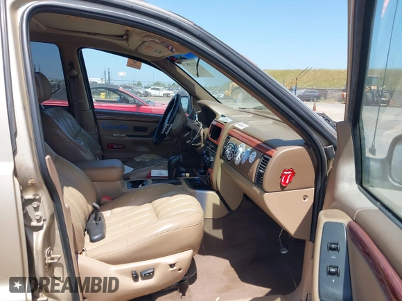 1999 Jeep Grand Cherokee Limited with VIN 1J4GW68N2XC654713, listed as a IAAI auction lot 42115829 with 195,988 mi miles. Bid and sale history available at carsss.com. Image 5.