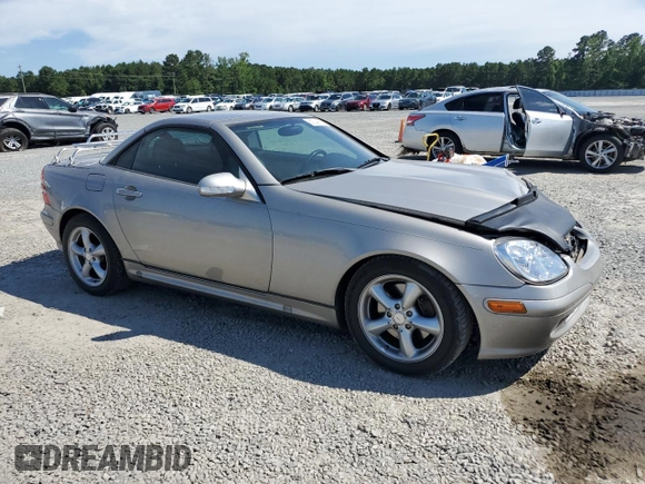 2003 Mercedes-Benz SLK 320 with VIN WDBKK65F03F286130, listed as a Copart auction lot 61544385 with 98,899 mi miles and Salvage title. Bid and sale history available at DreamBid. Image 4.