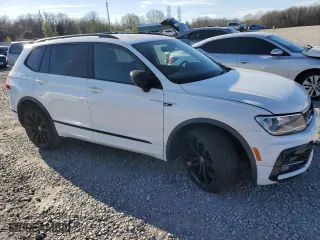 2020 Volkswagen Tiguan SE with VIN 3VV3B7AX6LM137524, listed as a Copart auction lot 49268985 with 124,407 mi miles and Salvage Title. Bid and sale history available at carsss.com. Image 4.