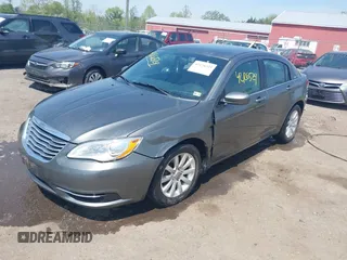 2012 Chrysler 200 Touring with VIN 1C3CCBBGXCN326023, listed as a IAAI auction lot 42126529 with 163,325 mi miles and . Bid and sale history available at carsss.com. Image 2.